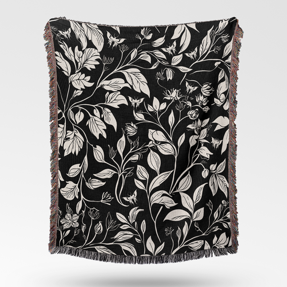 Floran woven throw blanket in black and white